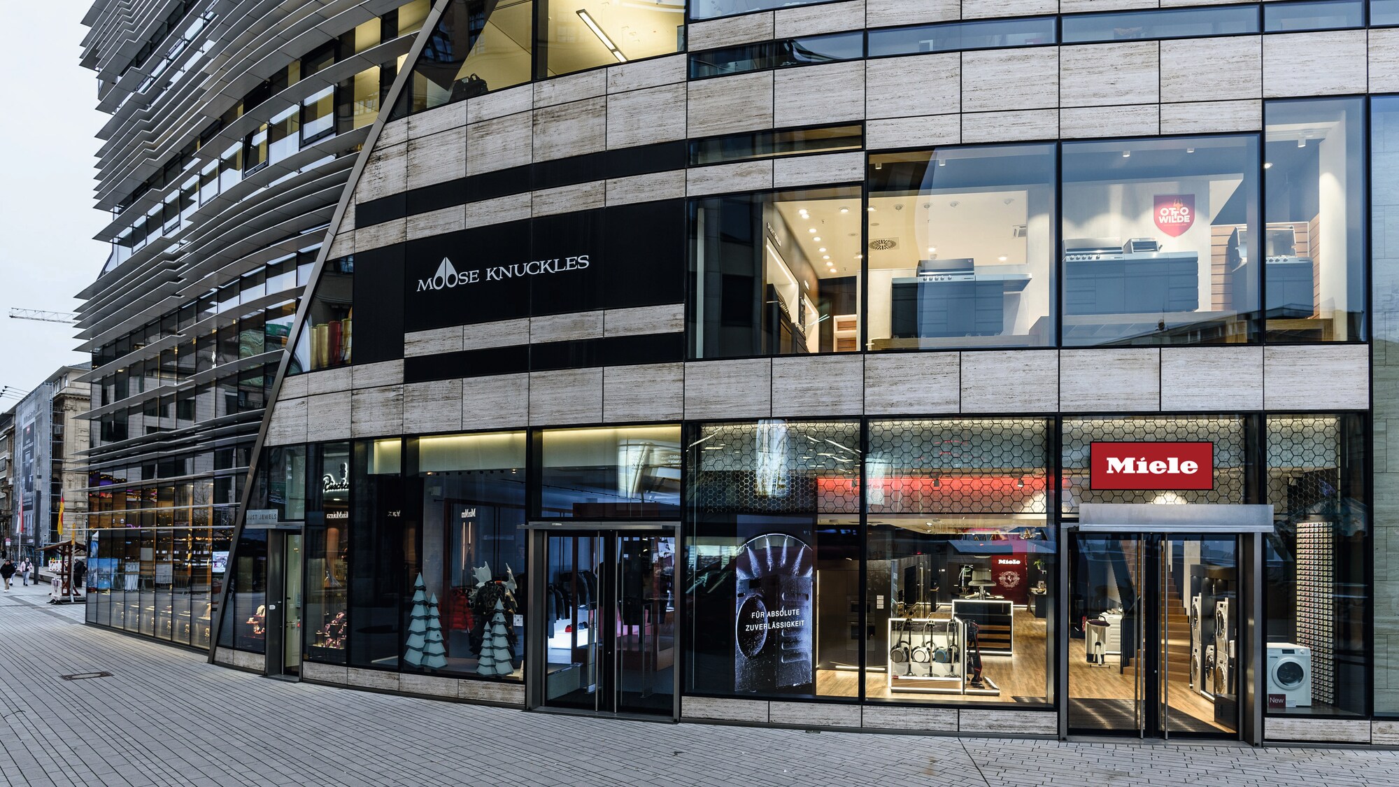 a Miele experience center exterior and its parking spots